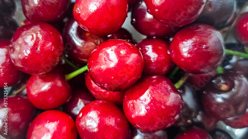  Close-up sweet cherry. Ripe red berries macro photography. Selective focus