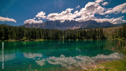 Timelapse view of Carezza lake in the Dolomites, Italian Alps photo