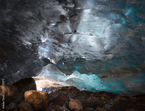 ice cave inside the Alibek mountain glacier in Dombai, Caucasus