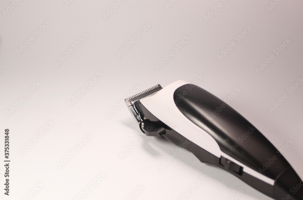black and white hair trimmer on a white background black and white hair trimmer on a white background
