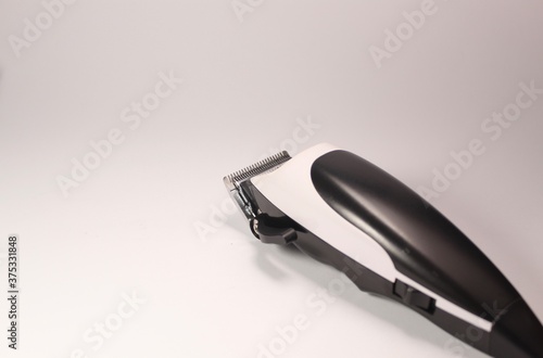 black and white hair trimmer on a white background