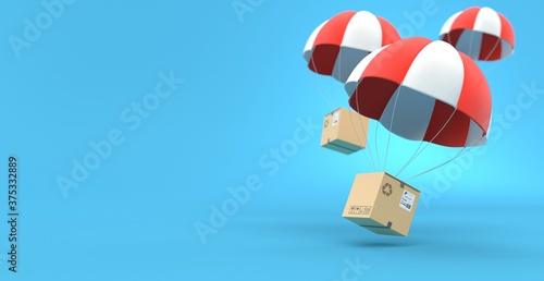 Cardboard boxes on parachute photo