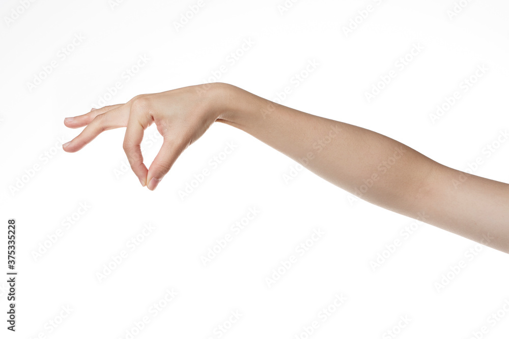 a woman's hand trying to grasp with her fingers.
a woman's hand trying to grasp with her fingers.