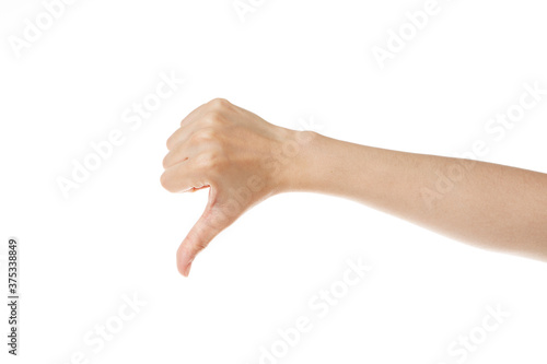 a woman's hand with her thumb down.