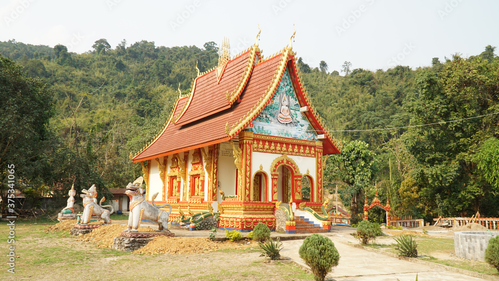 Temple Pagoda shrine near Pha Tang town in Laos. Temple Pagoda shrine near Pha Tang town in Laos.