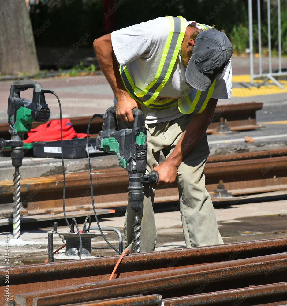 Man works at the railroad construction