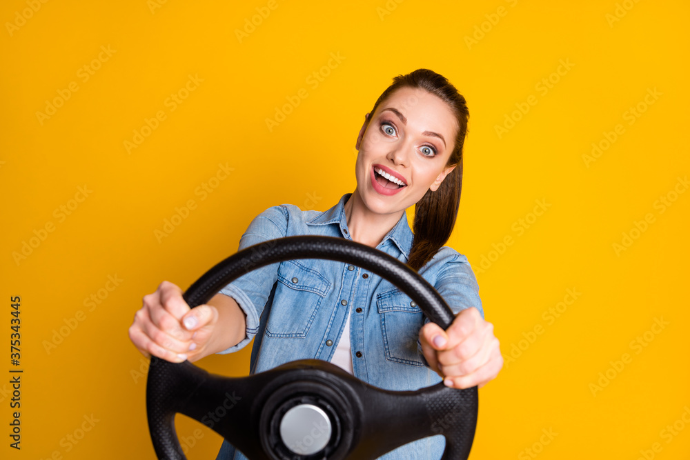 Photo of funny girl drive car hold steering wheel impressed fast speed wear style stylish trendy outfit isolated over bright shine color background