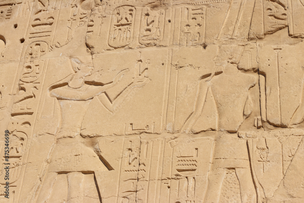 Ancient egyptian paintings and hieroglyphs on the wall in Karnak Temple Complex in Luxor, Egypt Ancient egyptian paintings and hieroglyphs on the wall in Karnak Temple Complex in Luxor, Egypt