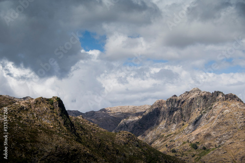 Clouds over wide mountain landscape