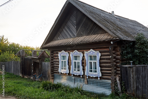 Old wooden dilapidated empty village house for sale
