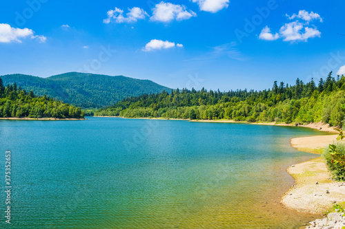 Beautiful nature in Croatia, lake Lepenica in Gorski kotar, green forest and mountains in background