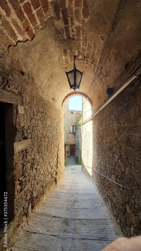 Vintage alleys of Cortona, a town that was an Etruscan lucumonia in Tuscany, Italy.