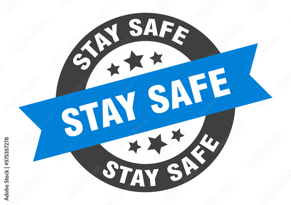 Fototapeta premium stay safe sign. round ribbon sticker. isolated tag