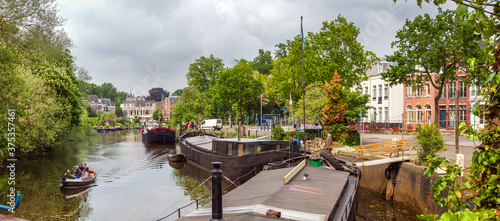 Canal with boat in the city of Zwolle, Netherlands photo