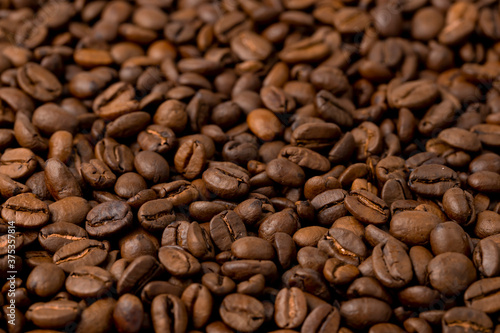   offee background. Texture of coffee beans as a natural background.