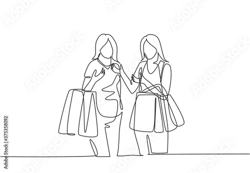 One continuous line drawing two young happy women friend holding paper bags while shopping together. Shopping clothing, dress, fashion, makeup in mall concept. Single line draw design illustration