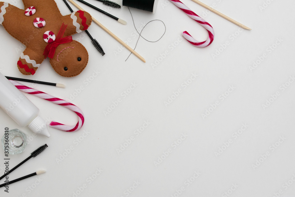 Beauty, brow and lash treatment products in a flat lay style with a white background. Christmas beauty theme background with copy space for text and customization Beauty, brow and lash treatment products in a flat lay style with a white background. Christmas beauty theme background with copy space for text and customization