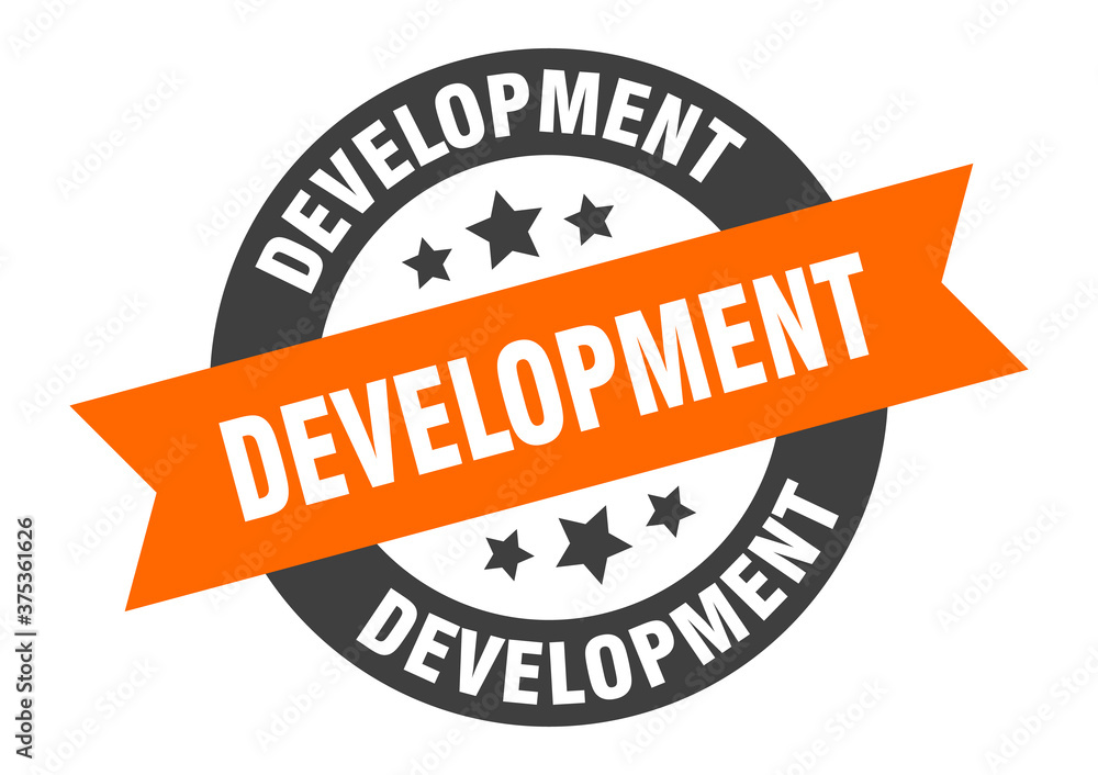 Fototapeta premium development sign. round ribbon sticker. isolated tag