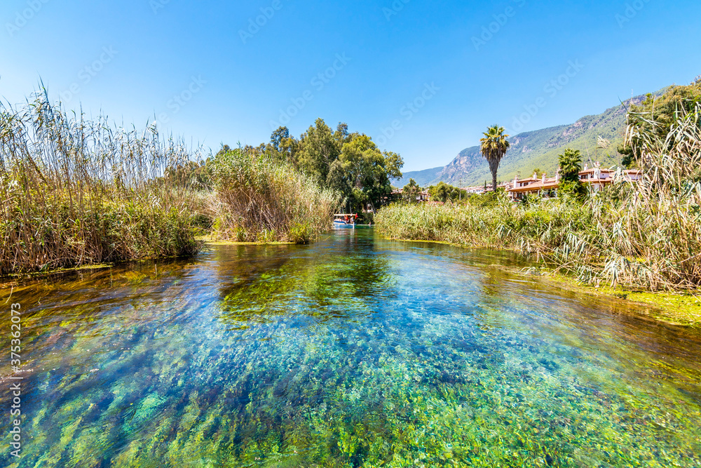 Taking tour on Azmak Stream in Akyaka Village. Akyaka is popular ...