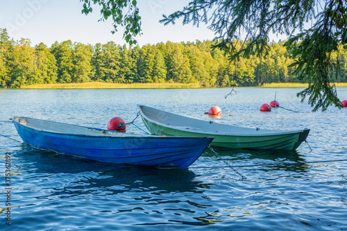 Fototapeta Naklejka Na Ścianę i Meble -  Rowing boats on The Lake Vittrask, Kirkkonummi, Finland