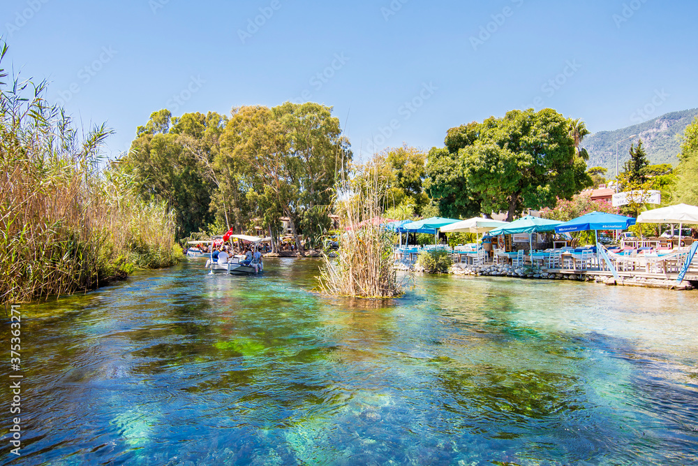 Taking tour on Azmak Stream in Akyaka Village. Akyaka is popular ...