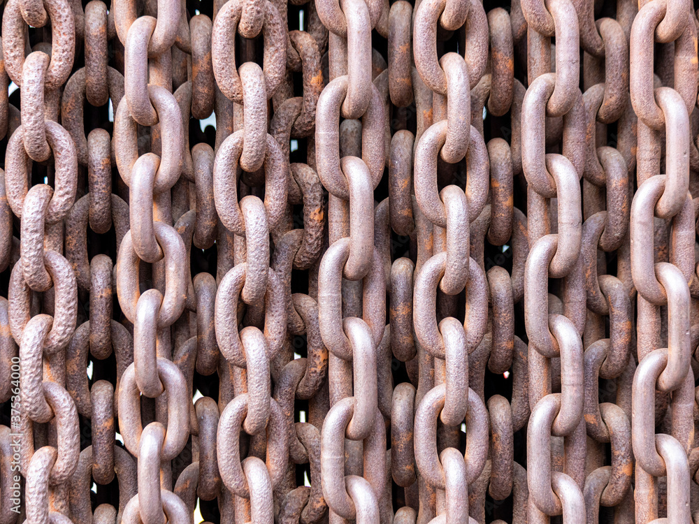Old rusty chains illustrating a concept of terror and iron curtain Old rusty chains illustrating a concept of terror and iron curtain