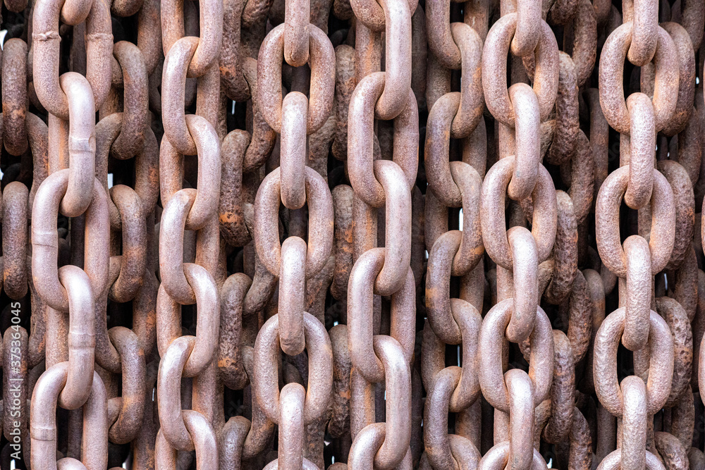 Old rusty chains illustrating a concept of terror and iron curtain Old rusty chains illustrating a concept of terror and iron curtain