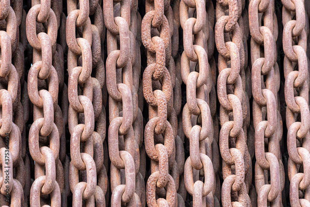 Old rusty chains illustrating a concept of terror and iron curtain Old rusty chains illustrating a concept of terror and iron curtain