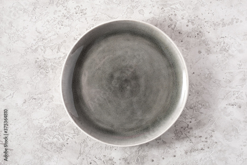 empty plate on concrete background