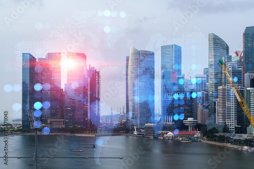 Photography World planet Earth map hologram over panorama city view of Singapore, Asia