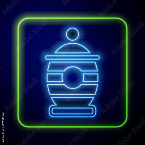 Glowing neon Funeral urn icon isolated on blue background. Cremation and burial containers, columbarium vases, jars and pots with ashes. Vector.