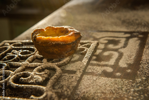 Homemade Portuguese custard pie in the morning sun