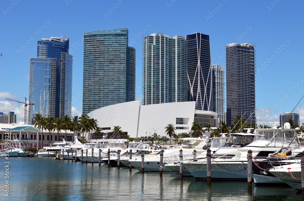 Luxury modern condominium towers overlooking a marina on the downtown Miami .Florida waterfront.