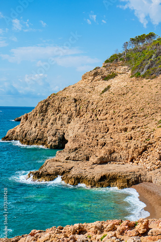 Llop Mari beach in Hospitalet del Infant, Spain photo