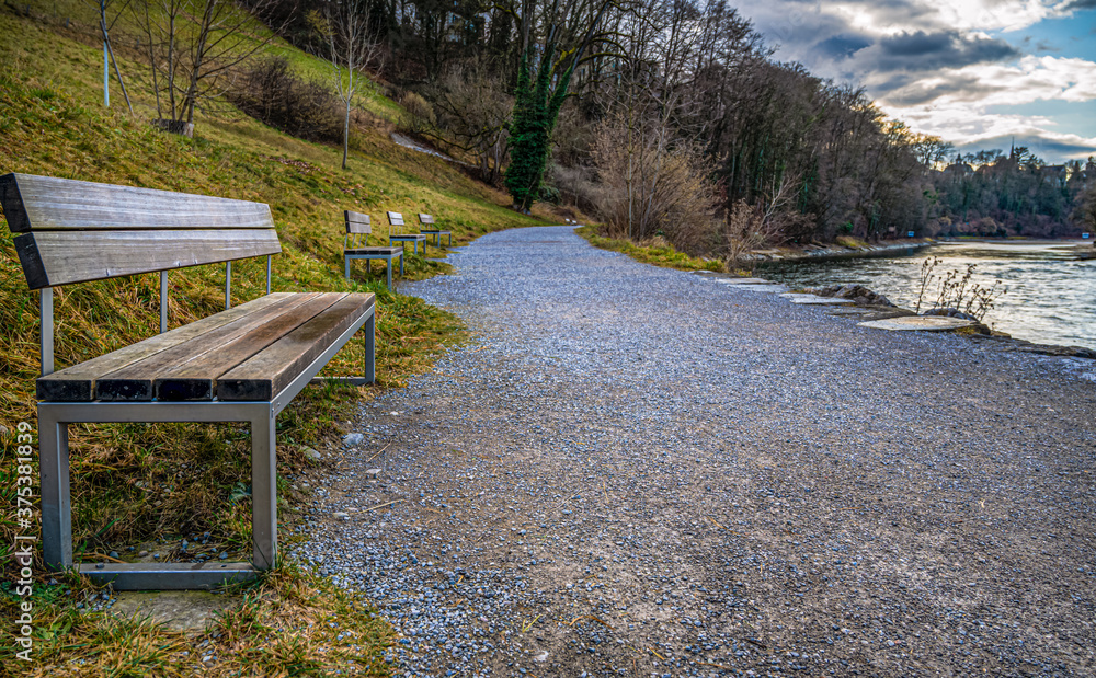Benches on the walking way along the Aare river in Bern, Switzerland