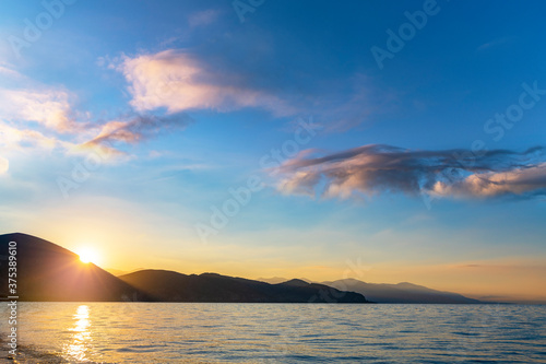 Beautiful sunrise landscape. The Mountains and lake early morning. Sevan National park Armenia.