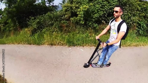 A guy on an electric scooter