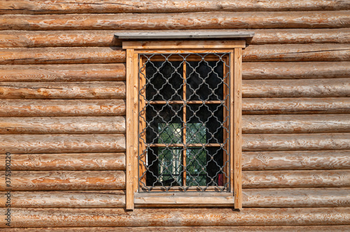 a window in a log house