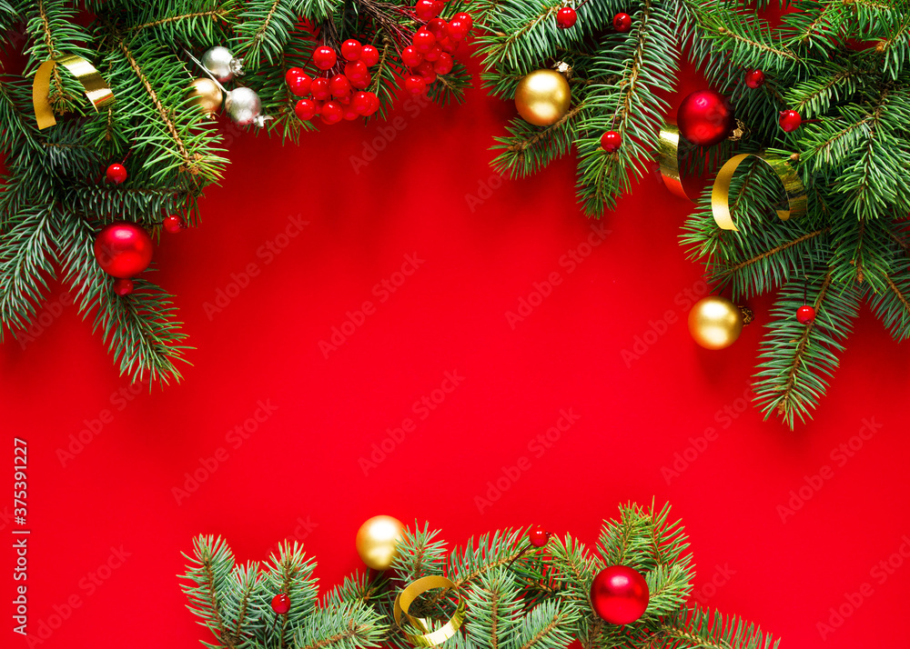 Christmas red background with christmas decorations, top view with space for text. Christmas red background with christmas decorations, top view with space for text.
