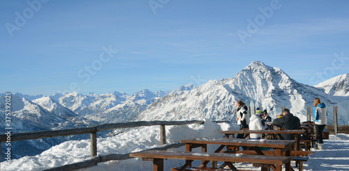 Fototapeta terrace on the alps in a San Sicario cottage overlooking mount Chaberton and sus
