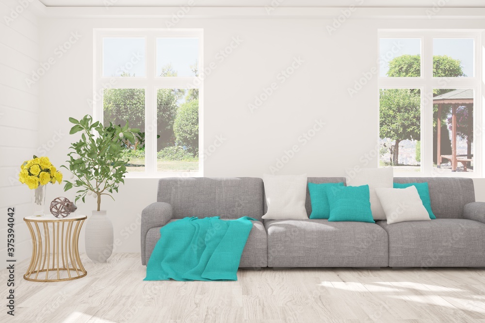 White stylish minimalist room with sofa and summer landscape in window. Scandinavian interior design. 3D illustration White stylish minimalist room with sofa and summer landscape in window. Scandinavian interior design. 3D illustration