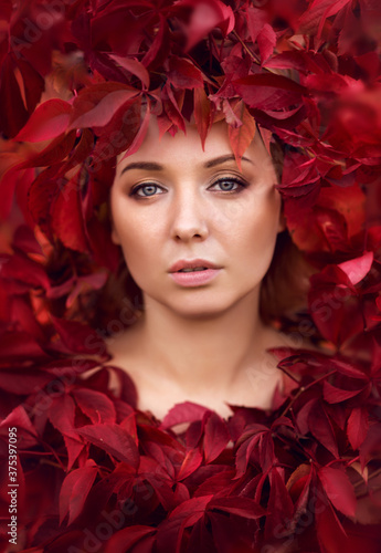 Fantasy Autumn Woman Fashion Portrait. Fall. Beautiful Model Girl with colourful autumn leaves hairstyle. © Марина Шавловская