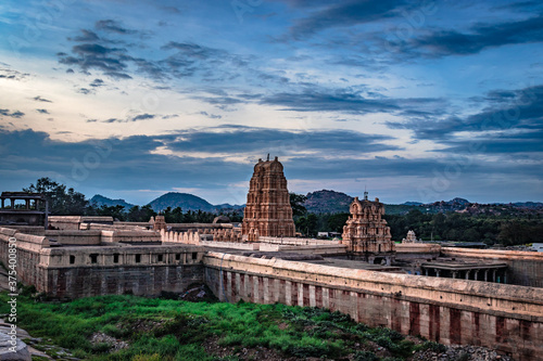 shree virupaksha temple view at evening with dramatic sky photo