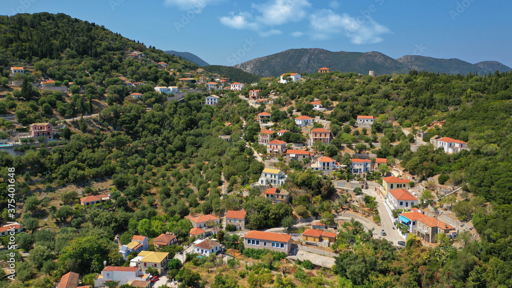 Fototapeta premium Aerial drone photo of picturesque beautiful seaside village of Kioni a safe anchorage for yachts and sail boats, a true gem of Ithaki or Ithaca island, Ionian, Greece