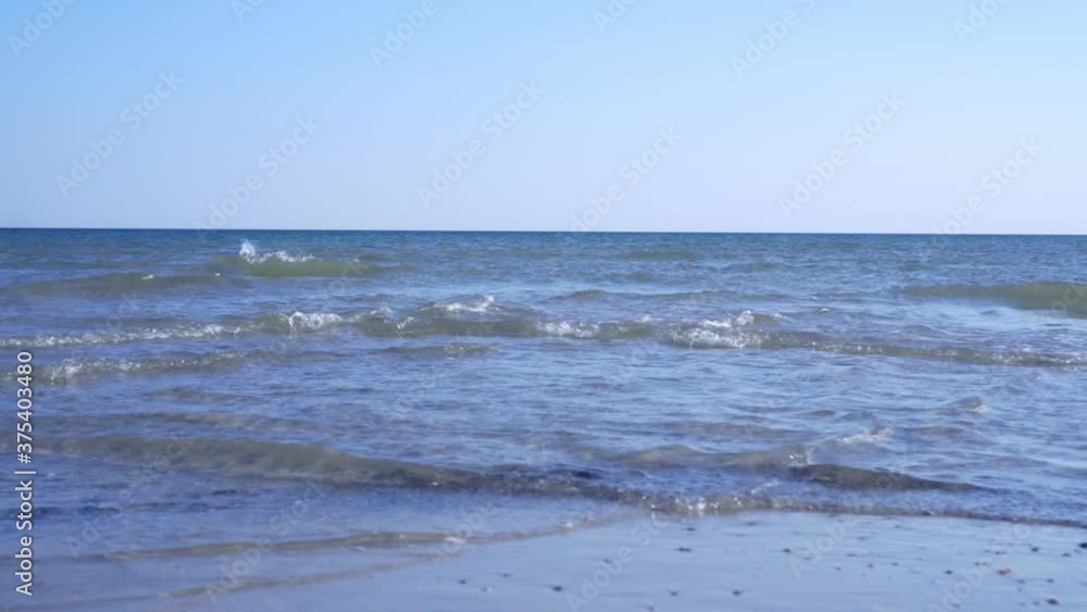 Moment of tide in the ocean. A strong current forming unexpected waves from a seemingly calm ocean or sea. A rare occurrence in nature. Moment of tide in the ocean. A strong current forming unexpected waves from a seemingly calm ocean or sea. A rare occurrence in nature.