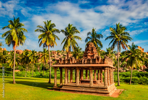 hampi ruins ancient art with bright blue sky flat angle shot photo