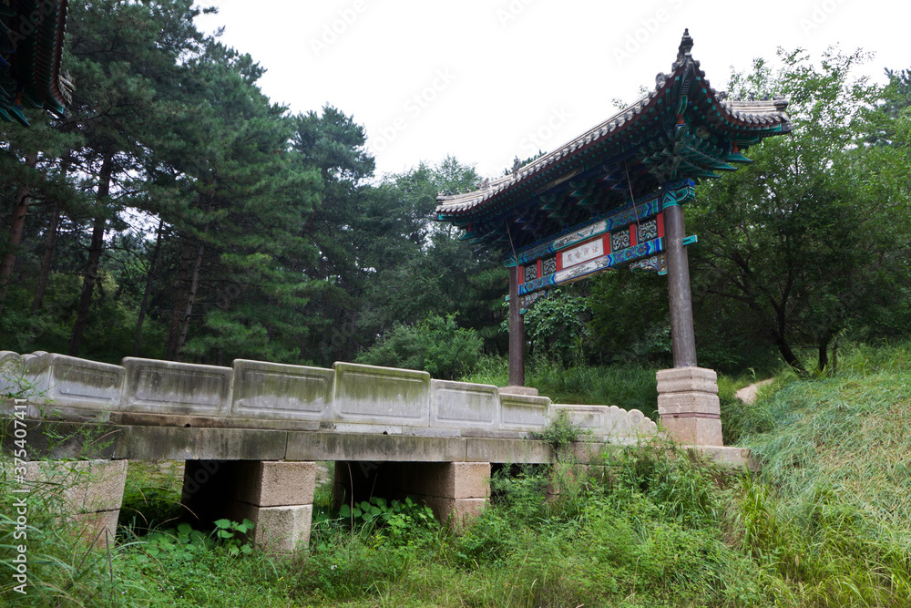 stone archway and stone bridge at a Chinese ancient garden stone archway and stone bridge at a Chinese ancient garden
