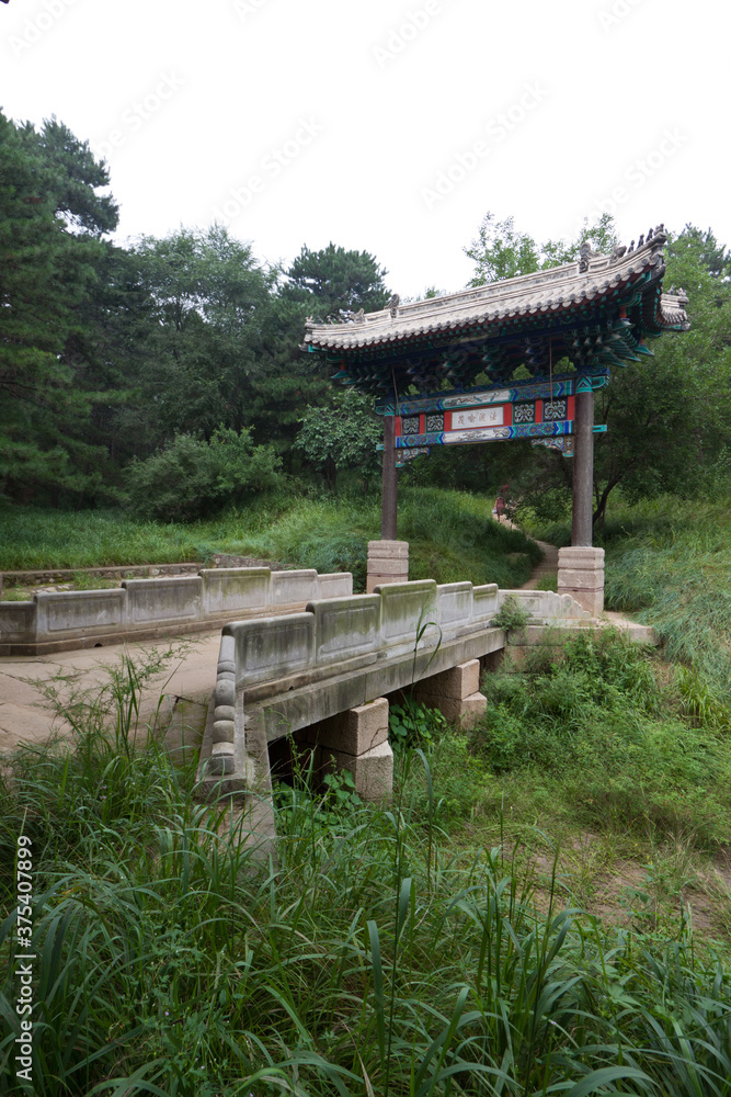 stone archway and stone bridge at a Chinese ancient garden stone archway and stone bridge at a Chinese ancient garden