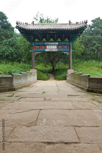 stone archway and stone bridge at a Chinese ancient garden