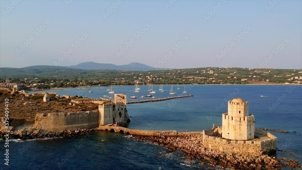 Aerial view over Methoni Castle and the fortified city. Its one of the most important and the biggest in castle in Mediterranean sea, a must-visit place in Greece located in Methoni, Messenia, Greece Aerial view over Methoni Castle and the fortified city. Its one of the most important and the biggest in castle in Mediterranean sea, a must-visit place in Greece located in Methoni, Messenia, Greece